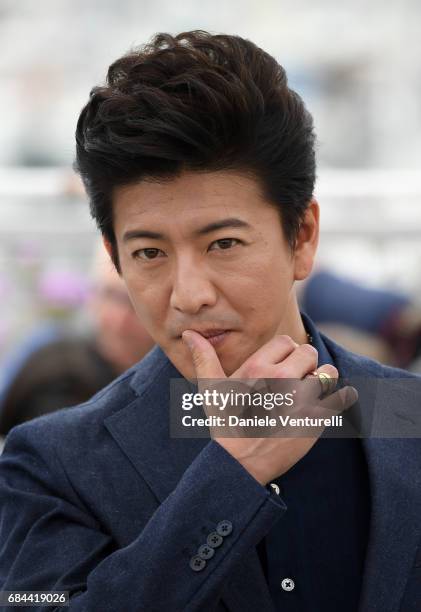 Takuya Kimura attends the "Blade Of The Immortal " photocall during the 70th annual Cannes Film Festival at Palais des Festivals on May 18, 2017 in...