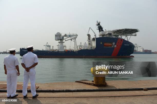 Indian coast guard personnel stand guard as Australian Border Force Cutter 'Ocean Shield' arrives at port in Chennai on May 18, 2017. Australian...