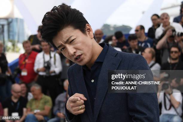 Japanese actor Takuya Kimura poses on May 18, 2017 during photocall for the film 'Blade of the Immortal' at the 70th edition of the Cannes Film...