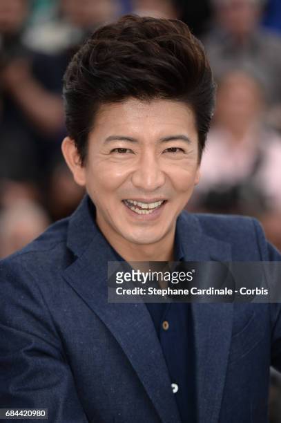 Takuya Kimura attends the "Blade Of The Immortal " photocall during the 70th annual Cannes Film Festival at Palais des Festivals on May 18, 2017 in...