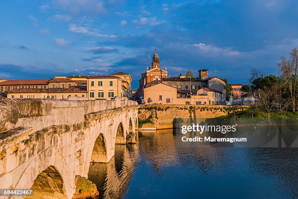 tiberio bridge and the town - rimini stock pictures, royalty-free photos & images