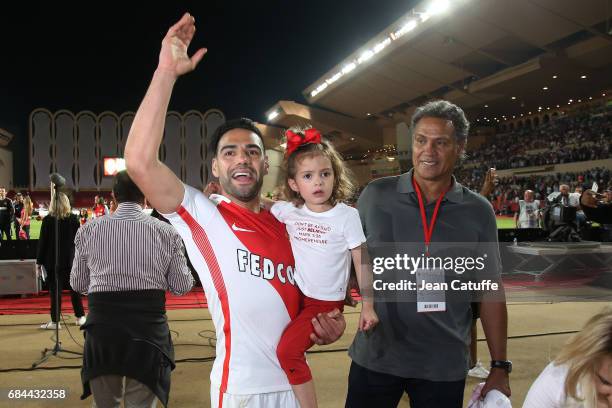 Radamel Falcao of Monaco, his daughter Dominique Garcia Taron and his father Radamel Garcia during the French League 1 Championship title celebration...