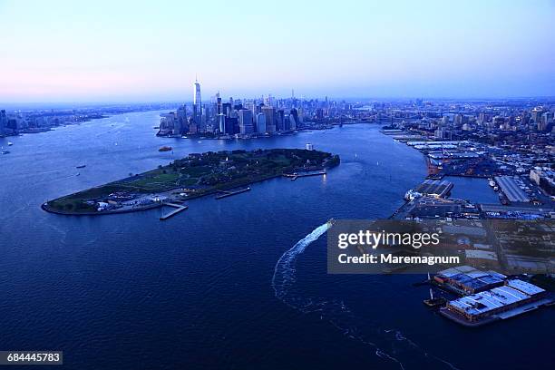 manhattan from above by helicopter - governors island stock pictures, royalty-free photos & images