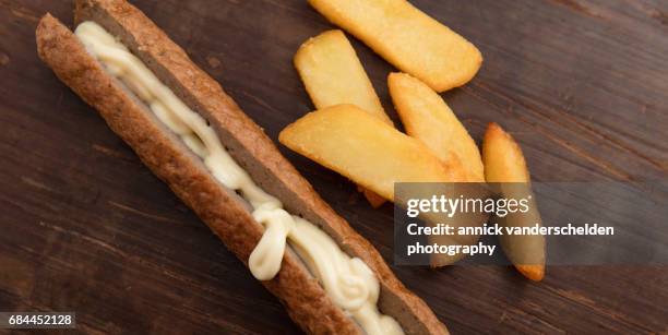 frikandel, french fries and mayonnaise. - frikadel stock-fotos und bilder