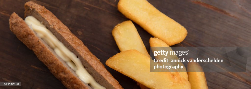 Frikandel, French fries and mayonnaise.