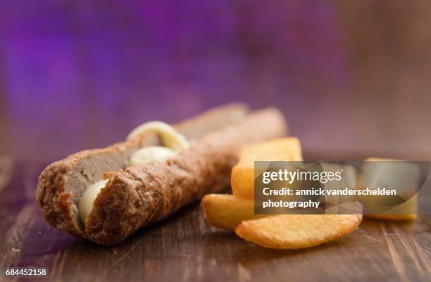 frikandel, french fries and mayonnaise. - frikadel stock-fotos und bilder