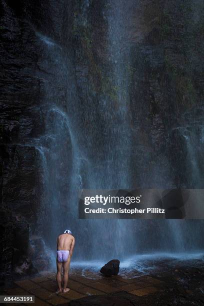 Masatsugu Okutani, 41 performs a waterfall purification ceremony at Kiyo-Taki waterfall. Purification is one of the most important aspects of Shinto...