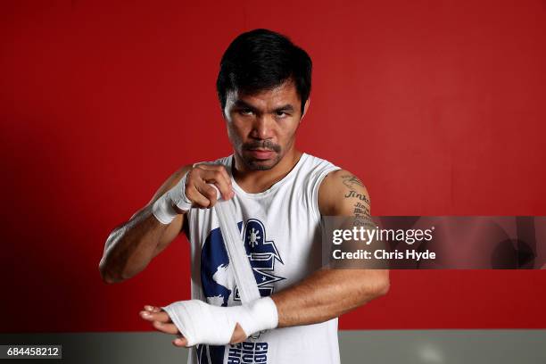 Manny Pacquiao warps his hands before a training session at the Elorde boxing Gym on May 19, 2017 in Manila, Philippines.