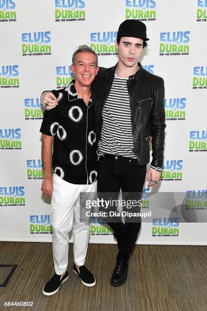 Leon Else poses with Elvis Duran during his visit to "The Elvis Duran Z100 Morning Show" at Z100 Studio on May 18, 2017 in New York City.