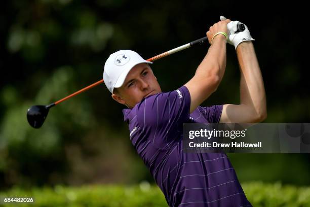 Jordan Spieth his a shot on the first tee during Round One of the AT&T Byron Nelson at the TPC Four Seasons Resort Las Colinas on May 18, 2017 in...