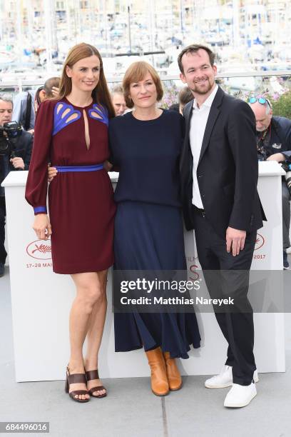 Janine Jackowski, director Valeska Grisebach and Jonas Dornbach attend "Western" Photocall during the 70th annual Cannes Film Festival at Palais des...