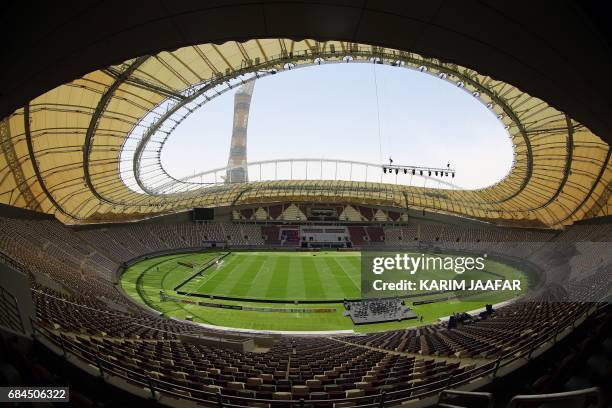 Picture taken with a fisheye lens on May 18 shows a general view of the Khalifa International Stadium in Doha after it was refurbished ahead of the...