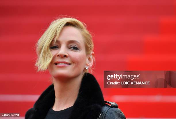 Actress and President of the Un Certain Regard jury Uma Thurman poses as she arrives on May 18, 2017 for the screening of the film 'Barbara' at the...