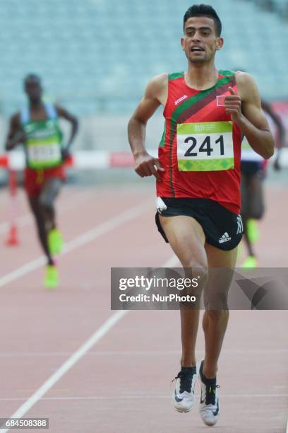 Mohamed Tindouft of Morocco celebrates his win in Men's 3000m Steeplechase final, during an athletic event at Baku 2017 - 4th Islamic Solidarity...