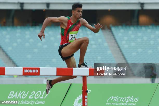 Mohamed Tindouft of Morocco celebrates his win in Men's 3000m Steeplechase final, during an athletic event at Baku 2017 - 4th Islamic Solidarity...