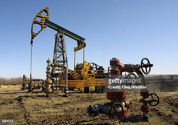 Oil wells owned by the Yukos company are shown April 24, 2002 in Nefteyugansk, Siberia. Yukos is a fully integrated oil-and-gas company headquartered...