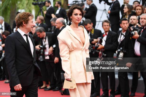 Actress Jeanne Balibar and actor Mathieu Amalric of 'Barbara' attends the "Loveless " screening during the 70th annual Cannes Film Festival at Palais...
