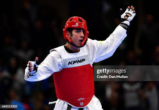 Ahmad Mohammadi of Iran reacts after conceding the winning point to Ramin Azizov of Azerbaijan in the Mens Taekwondo -87kg Final during day seven of...