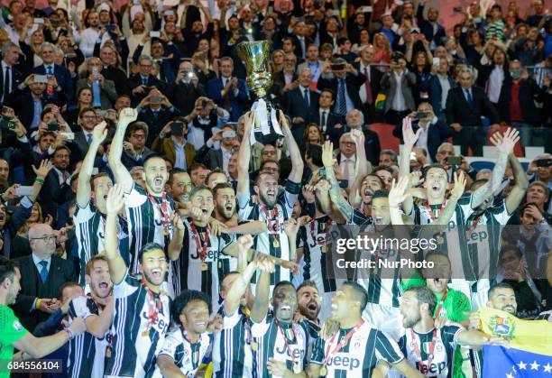 Players of Juventus FC celebrates with the trophy after winning the TIM Cup Final match against SS Lazio at the Olympic Stadium in Rome, on may 17,...