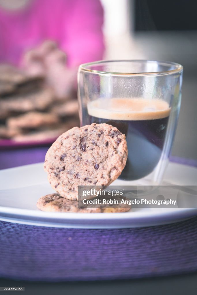 Homemade chocolate cookies with a hot black coffee