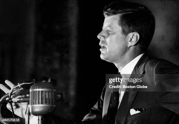 Senator John F. Kennedy flashes a grateful smile to delegates at the Massachusetts State Labor Council convention at the Statler-Hilton Hotel in...