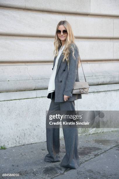 Senior buyer at Net a Porter Holly Estelle Russell wears a Chloe bag, Prada suit, Iris and Ink shirt on day 3 during Paris Fashion Week Autumn/Winter...