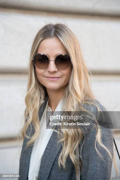 Senior buyer at Net a Porter Holly Estelle Russell wears a Prada suit, Iris and Ink shirt on day 3 during Paris Fashion Week Autumn/Winter 2017/18 on...