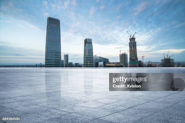 marble platform with modern skyscraper as background in beijing cbd area - heliporto imagens e fotografias de stock