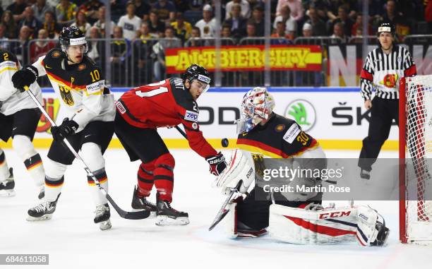 Philipp Grubauer of Germany saves an attempt at goal from Brayden Point of Canada during the 2017 IIHF Ice Hockey World Championship Quarter Final...