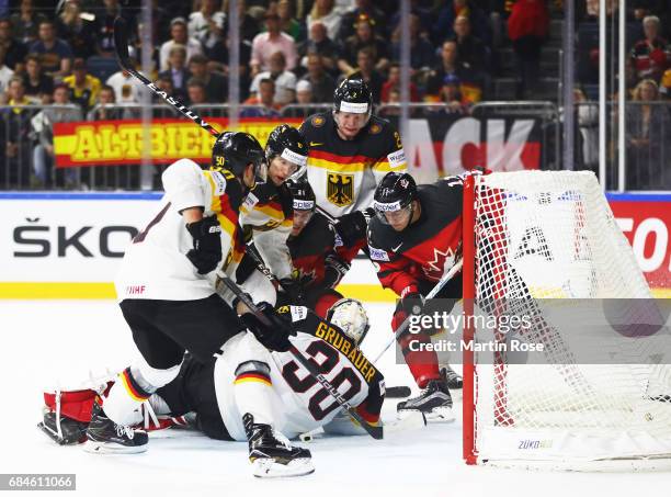 Philipp Grubauer of Germany saves an attempt at goal during the 2017 IIHF Ice Hockey World Championship Quarter Final game between Canada and Germany...