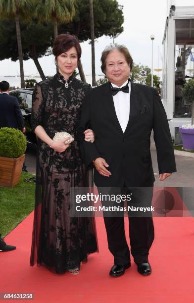 Joyce Godenzi and Sammo Hung attend Sunny Media Cocktail during the 70th annual Cannes Film Festival at Grand Hotel on May 18, 2017 in Cannes, France.