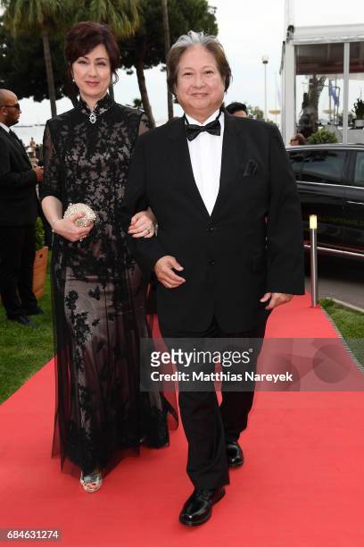 Joyce Godenzi and Sammo Hung attend Sunny Media Cocktail during the 70th annual Cannes Film Festival at Grand Hotel on May 18, 2017 in Cannes, France.