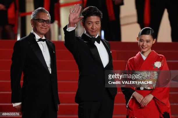 Japanese director Takashi Miike, Japanese actor Takuya Kimura and Japanese actress Hanna Sugisaki pose on May 18, 2017 as they arrive for the...