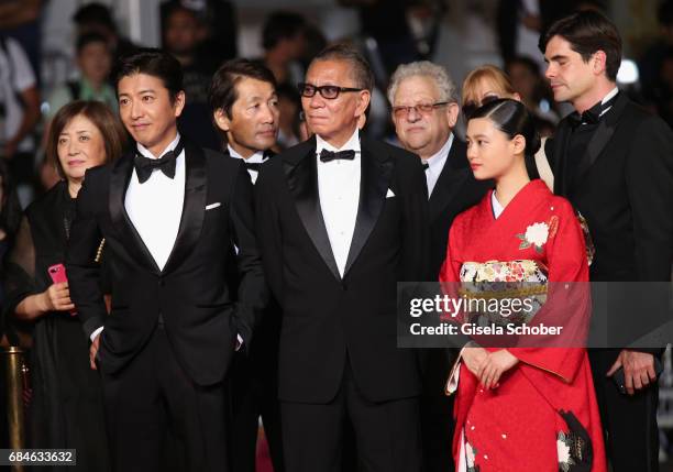 Takuya Kimura, director Takashi Miike and Hana Sugisaki attend the "Blade Of The Immortal " premiere during the 70th annual Cannes Film Festival at...