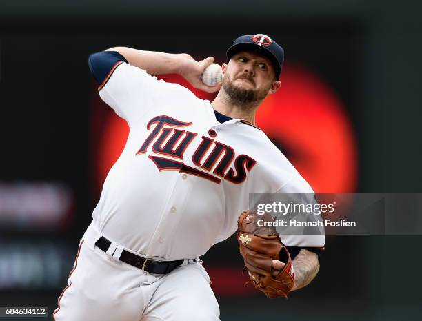 Ryan Pressly of the Minnesota Twins delivers a pitch against the Colorado Rockies during the eighth inning of game one of a doubleheader on May 18,...