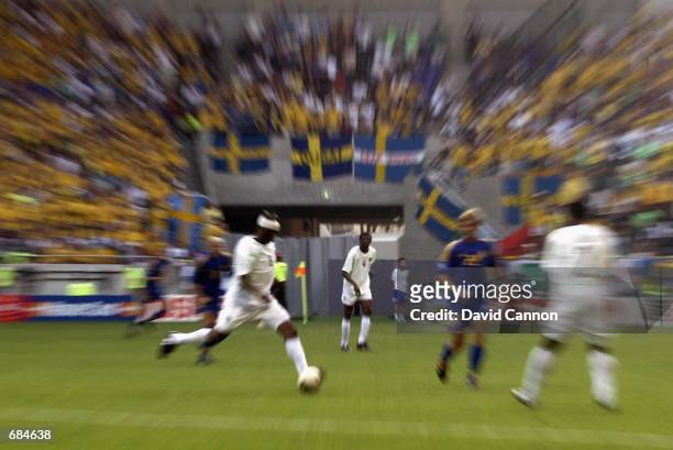 Explosive action taken during the FIFA World Cup Finals 2002 Group F match between Sweden and Nigeria played at the Kobe Wing Stadium, in Kobe, Japan...