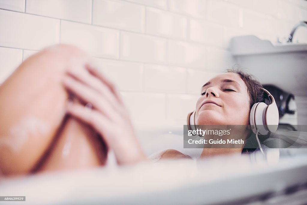 Woman enjoying a bath.
