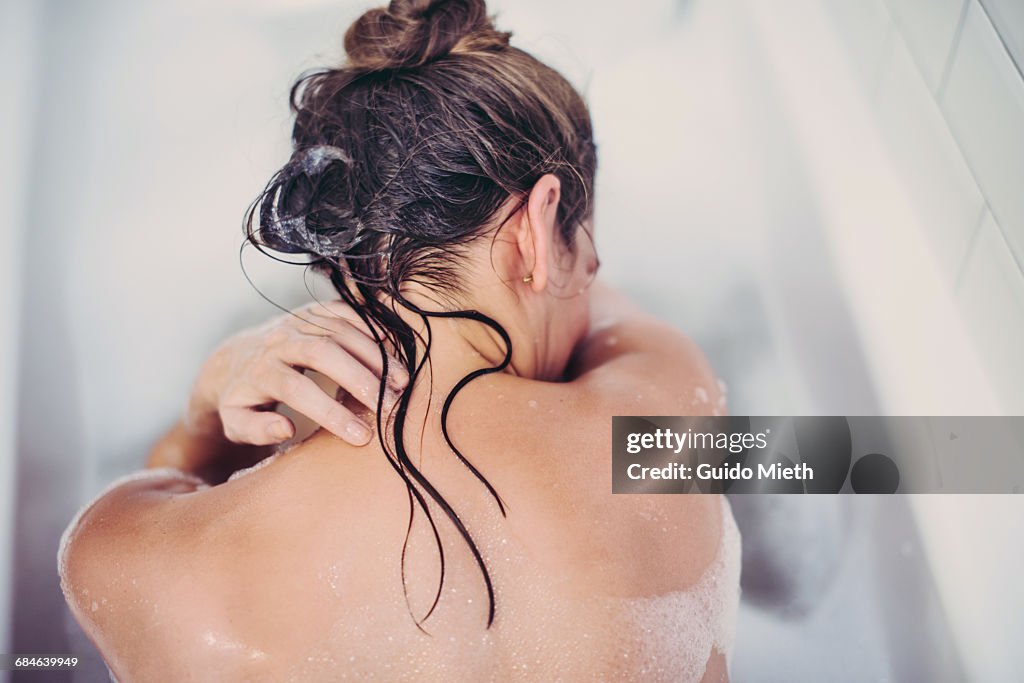 Woman in a bathtube.