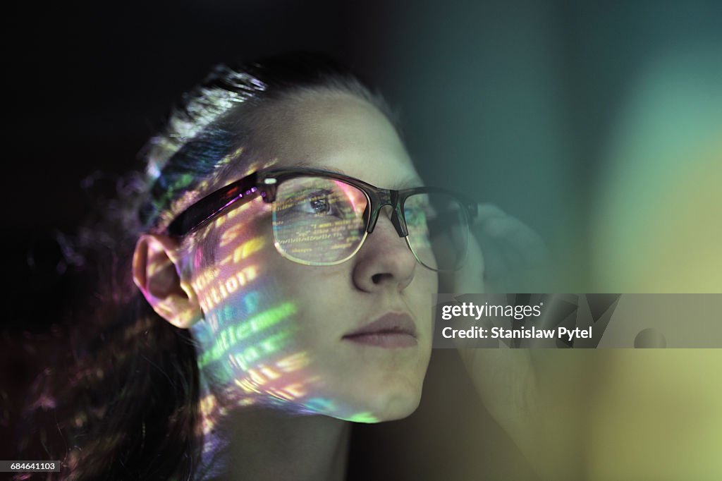 Portrait, girl lighted with colorful code