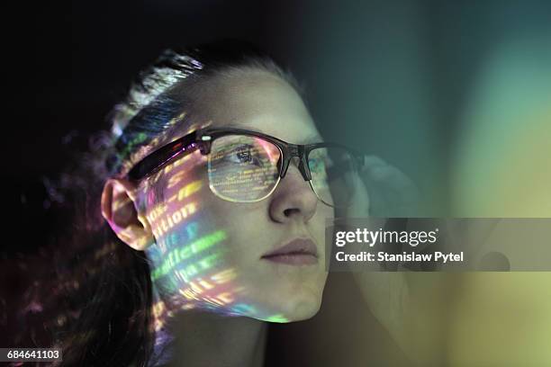 portrait, girl lighted with colorful code - des gens intelligents photos et images de collection