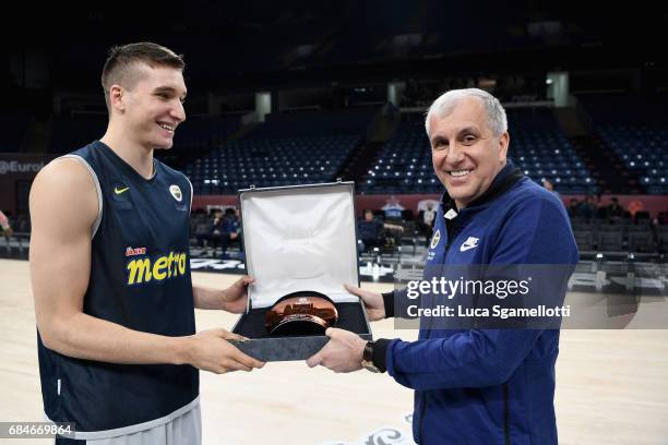 Bogdan Bogdanovic, #13 of Fenerbahce Istanbul recives the April Euroleague MVP from his Head Coach Zeljko Obradovic during the 2017 Turkish Airlines...