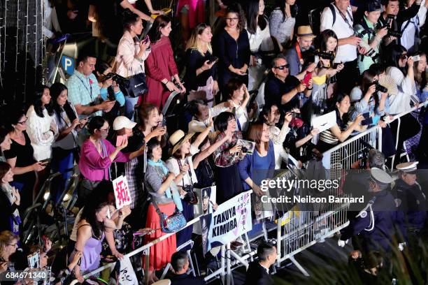 Fans are seen at the "Blade Of The Immortal " screening during the 70th annual Cannes Film Festival at Palais des Festivals on May 18, 2017 in...