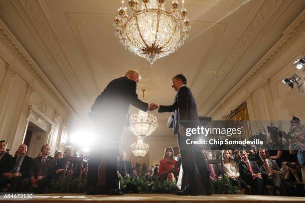 President Donald Trump and Colombian President Juan Manuel Santos shake hands during a joint news conference at the White House May 18, 2017 in...