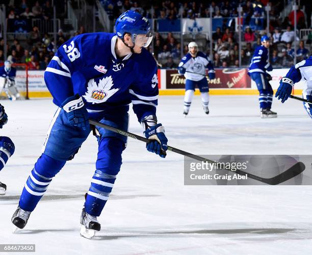 Colin Greening ""of the Toronto Marlies watches the play develop against the Syracuse Crunch during game 6 action in the Division Final of the Calder...