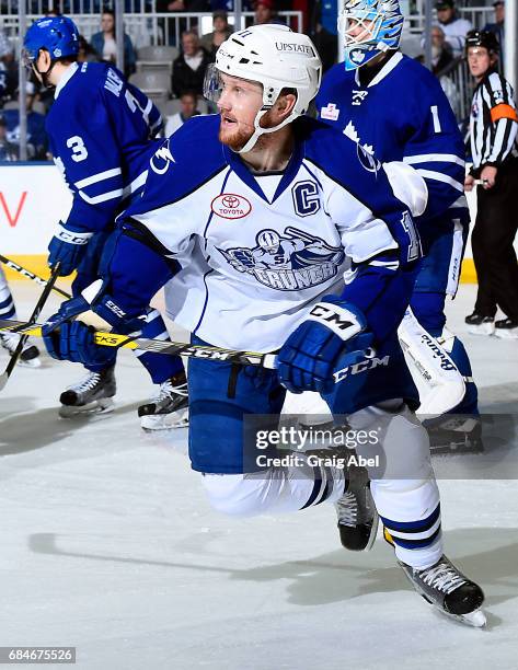 Erik Condra of the Syracuse Crunch turns up ice against the Toronto Marlies during game 6 action in the Division Final of the Calder Cup Playoffs on...