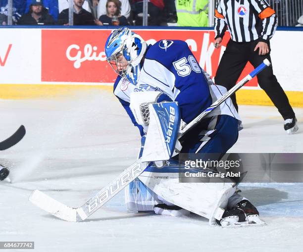 Mike McKenna of the Syracuse Crunch stops a shot against the Toronto Marlies during game 6 action in the Division Final of the Calder Cup Playoffs on...