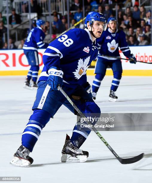 Colin Greening of the Toronto Marlies turns up ice against the Syracuse Crunch during game 6 action in the Division Final of the Calder Cup Playoffs...