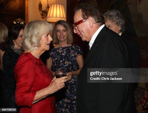 Camilla, Duchess of Cornwall, Patron of the London Library,chats with Maurice Saatchi as she hosts a dinner and evening of readings in honour of the...