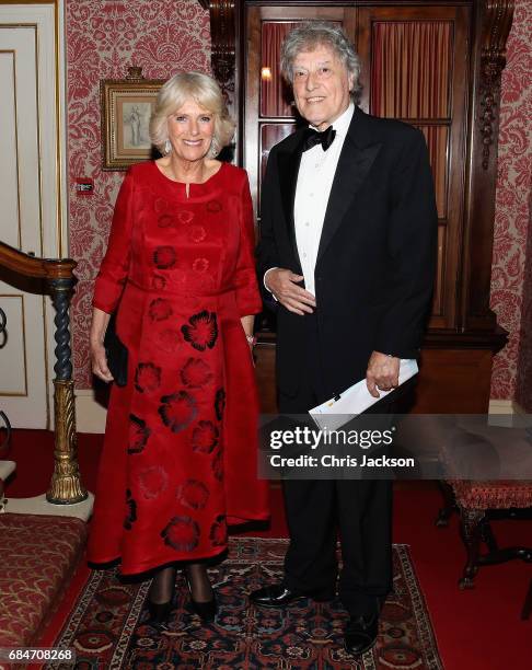 Camilla, Duchess of Cornwall, Patron of the London Library, hosts a dinner and evening of readings in honour of the Library's President, Sir Tom...