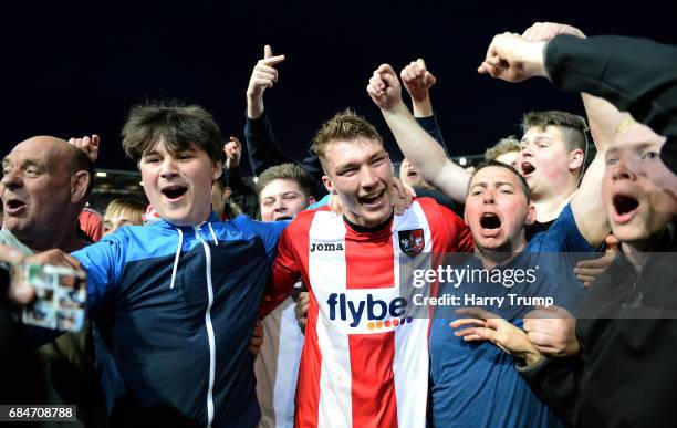 Jack Stacey of Exeter City celebrates after the match with fans after scoring the winning goal during the Sky Bet League Two Play off Semi Final...